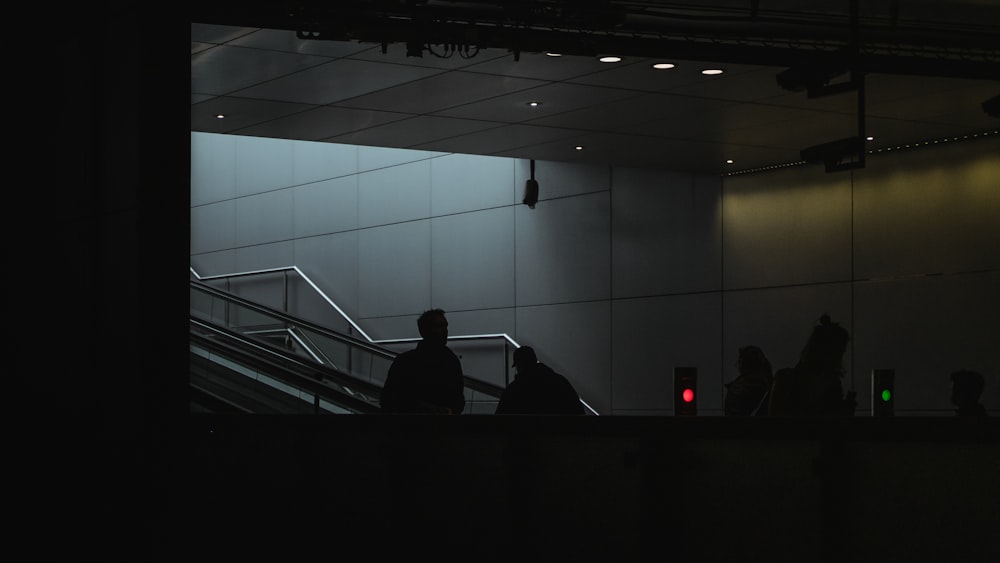 silhouette of people on stairs