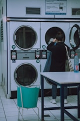 woman washing her clothes photograph