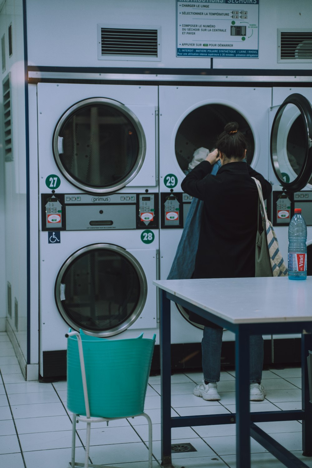 woman washing her clothes photograph