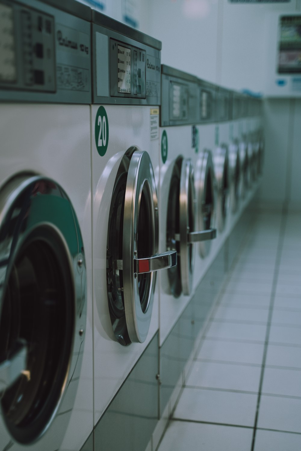 selective focus photography of inline front-load washers