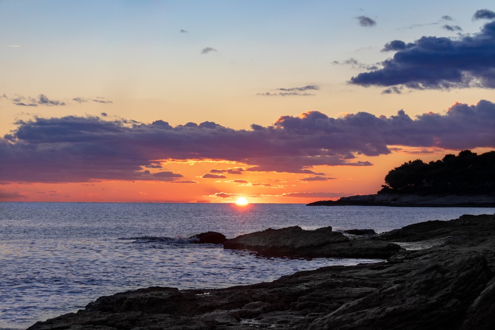 sunset by the seashore during golden hour