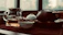 A serene tea setting with delicate porcelain cups and soft rising steam.