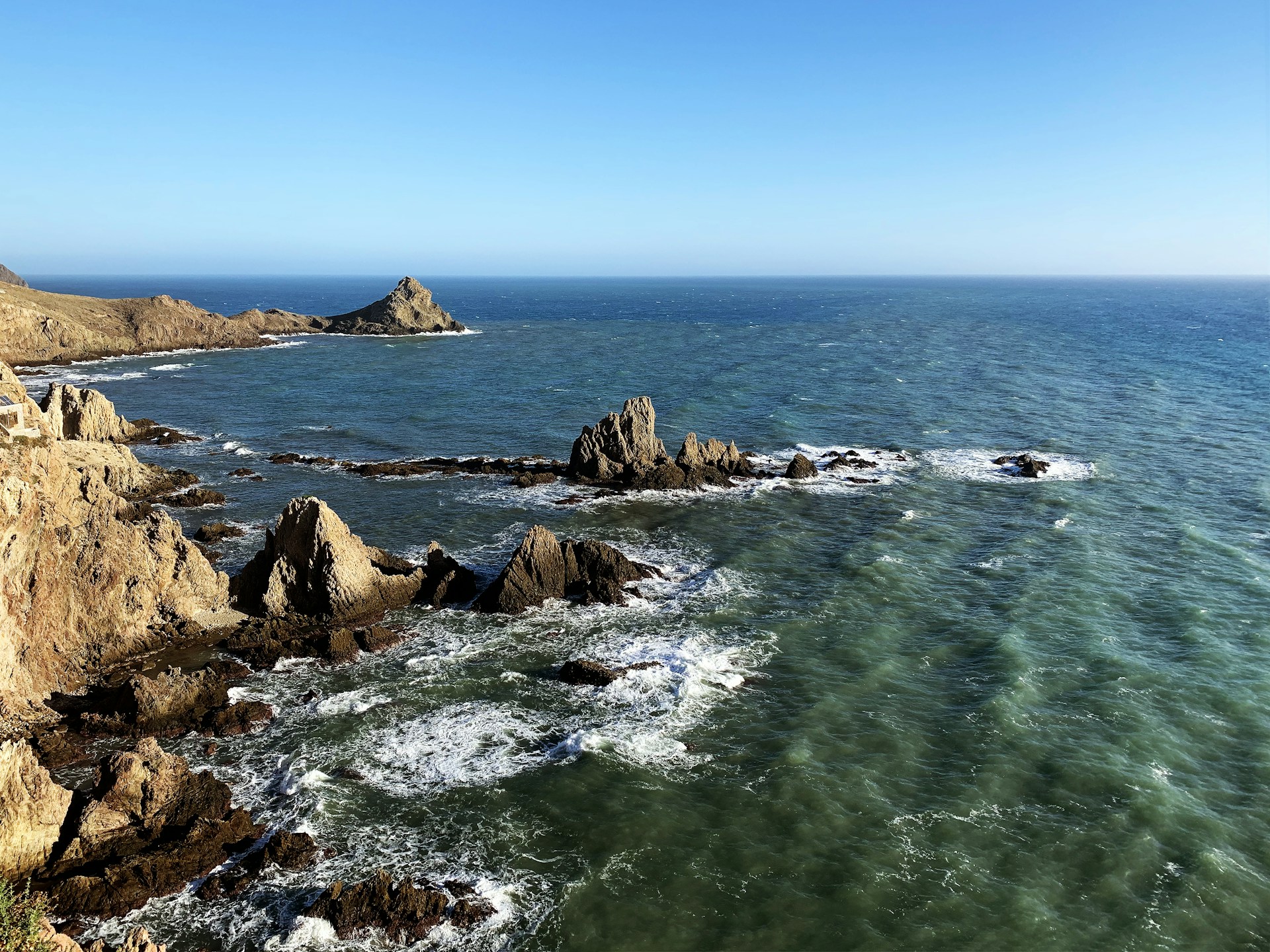 boulders facing ocean