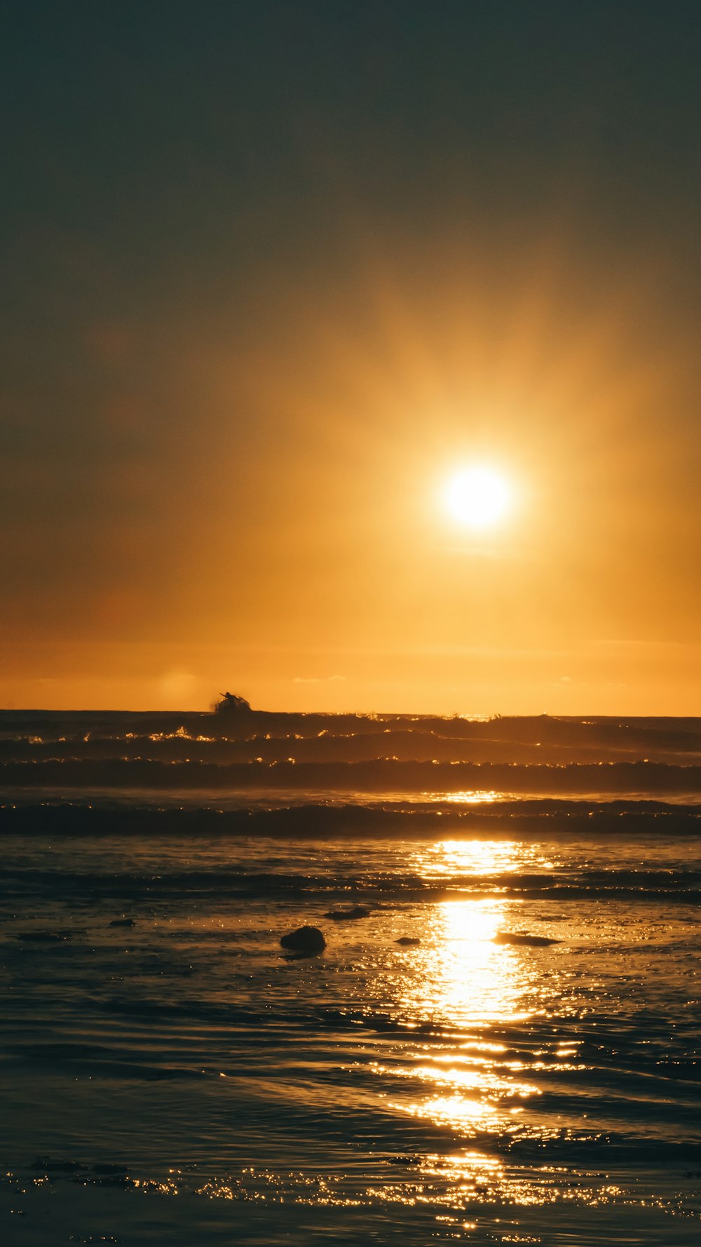 body of water during golden hour