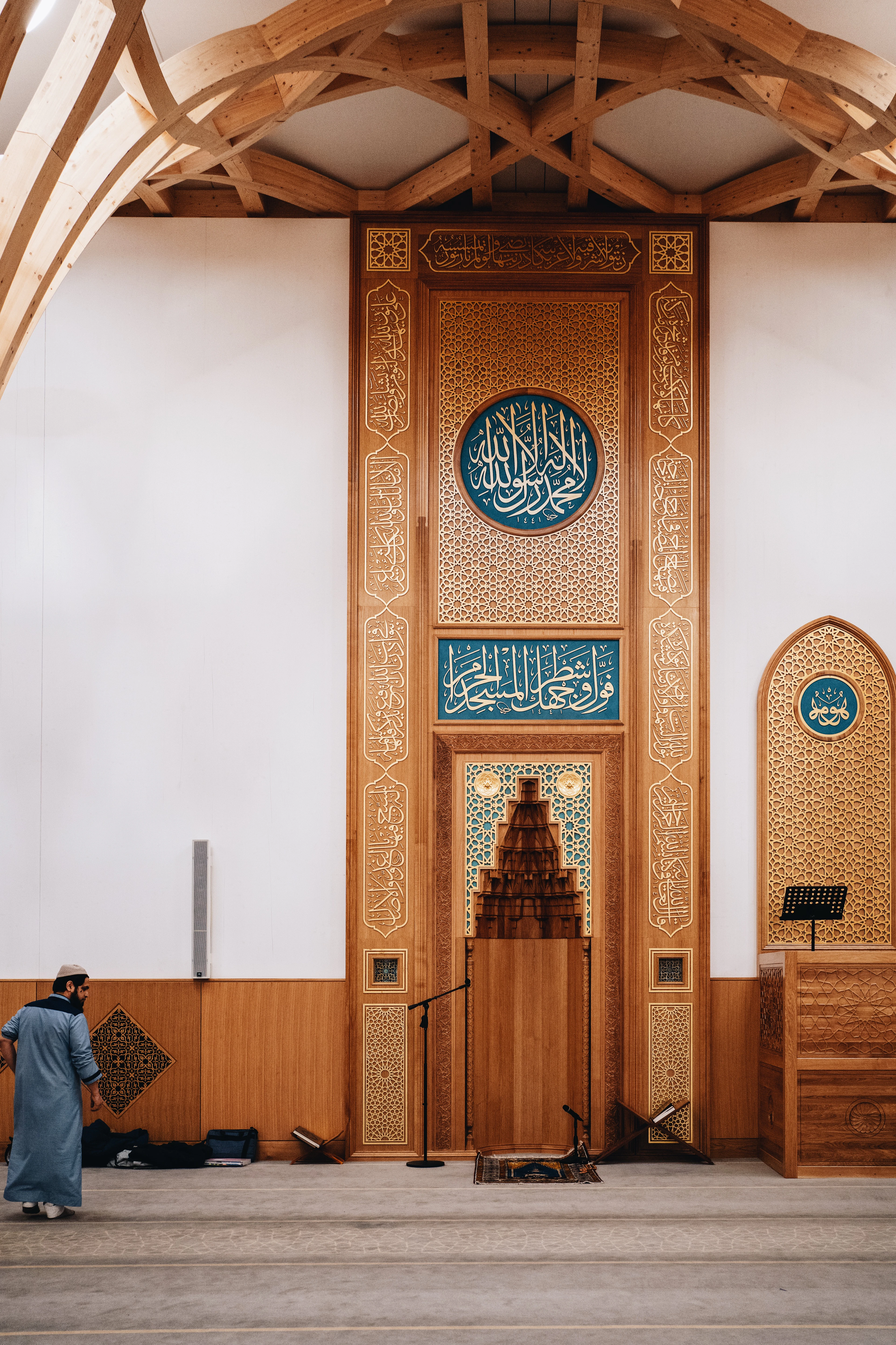 The prayer hall at Masjid Ibrahim, lined with warm arches