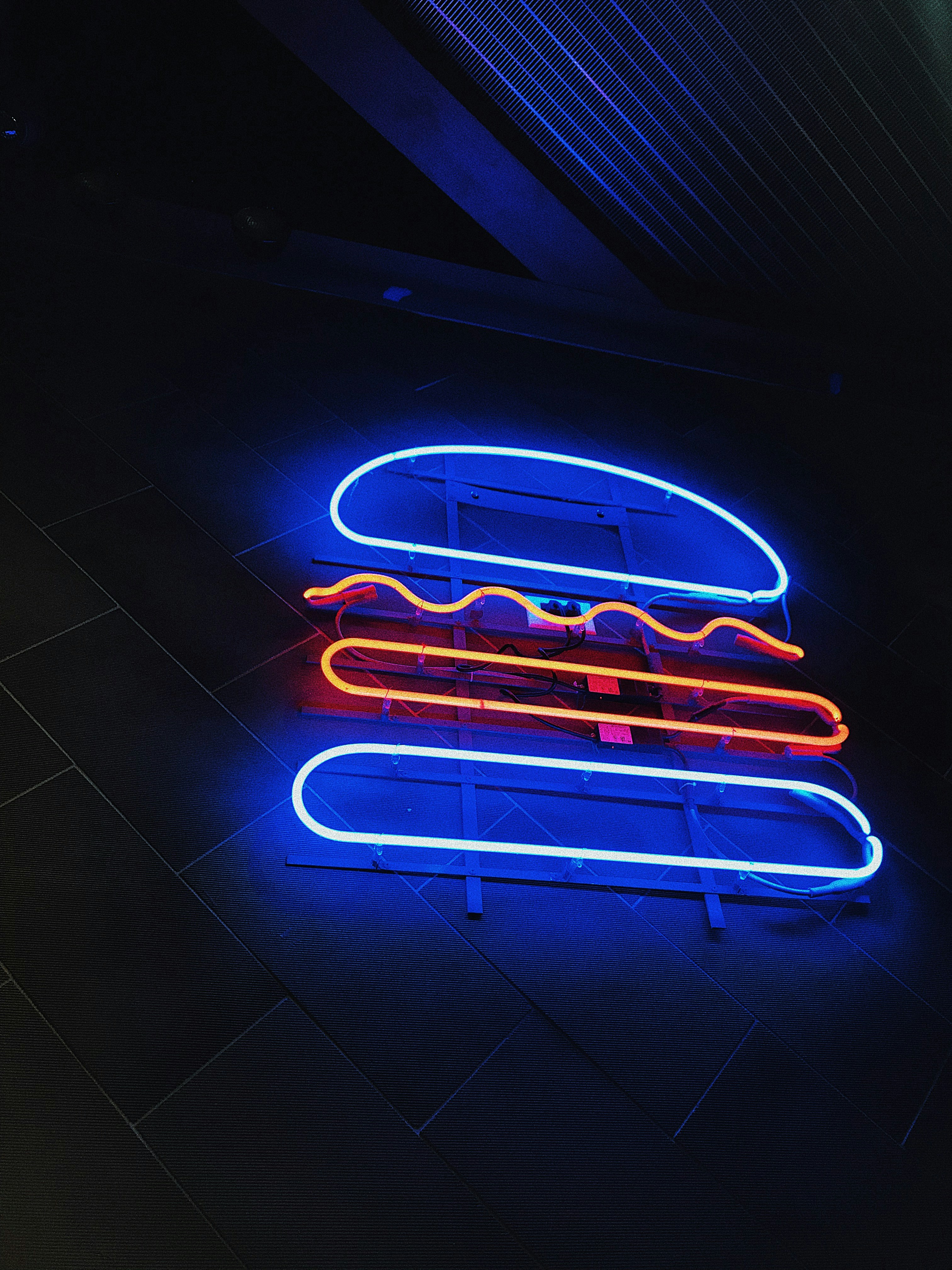 orange and blue hamburger neon sign
