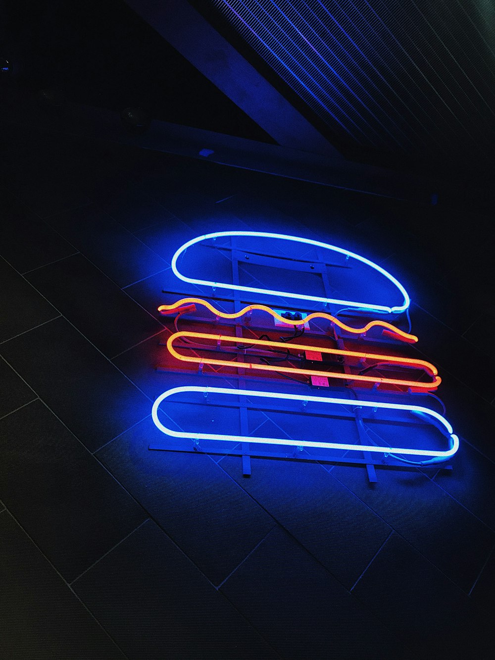 orange and blue hamburger neon sign