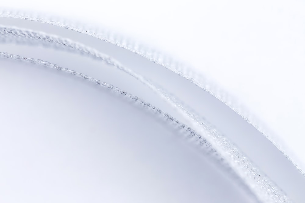 a close up of a white background with lines