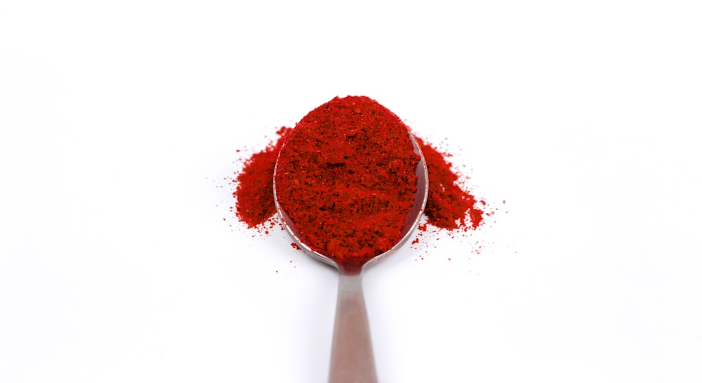 spoon of red powder