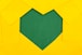 yellow papers forming green heart hole
