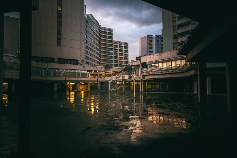 high-rise buildings under heavy clouds