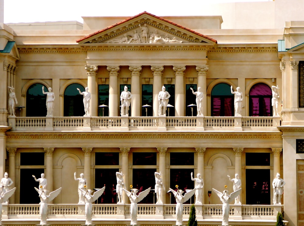 statues on building during day