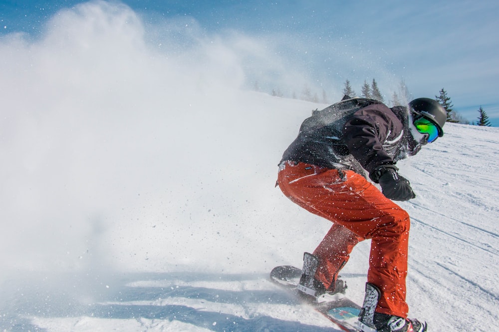 man snowboarding