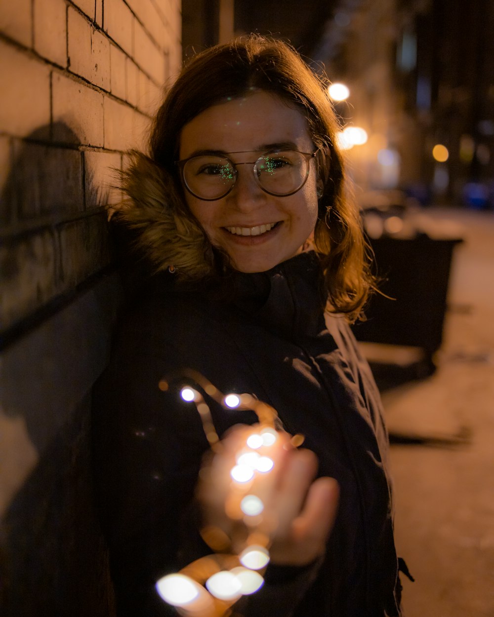 shallow focus photo of woman wearing eyeglasses with black frames