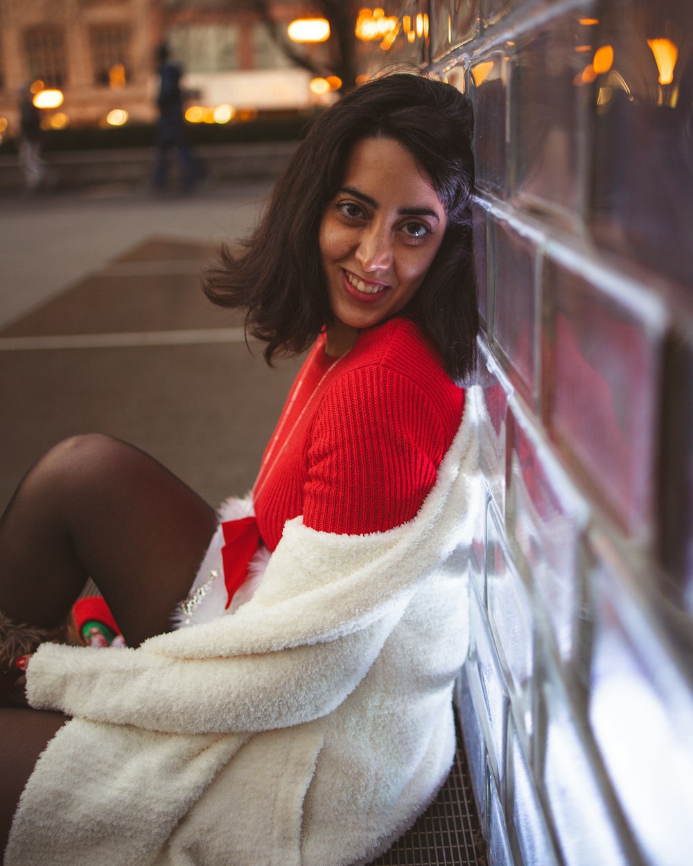 shallow focus photo of woman in white jacket