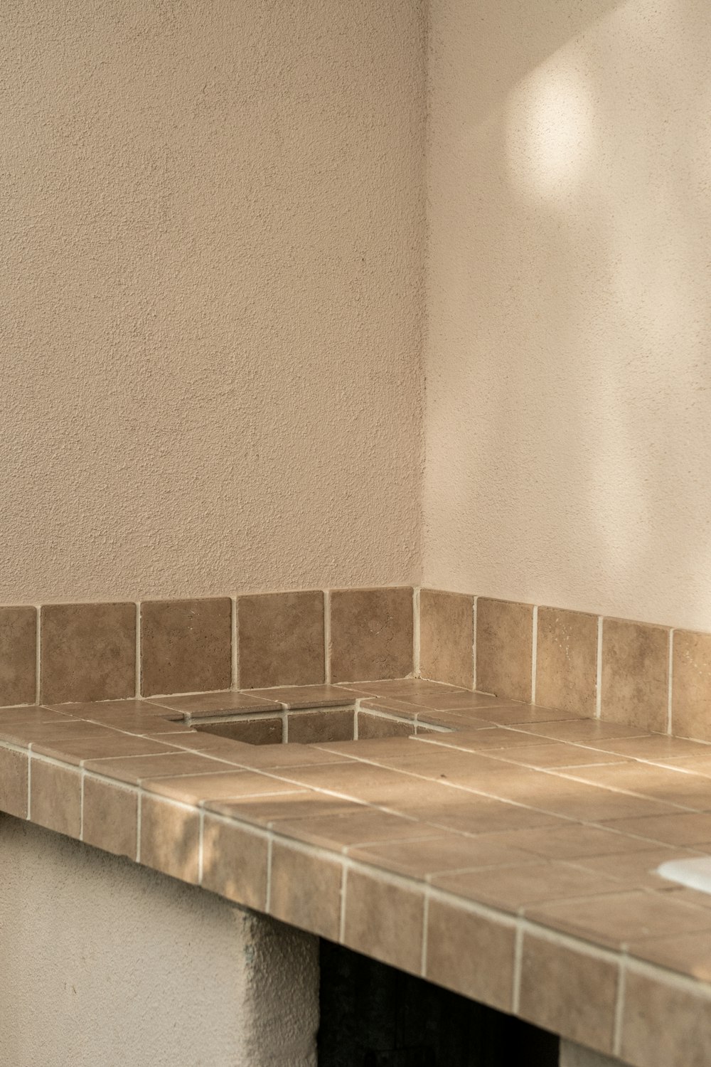 a bathroom counter with a sink and a mirror