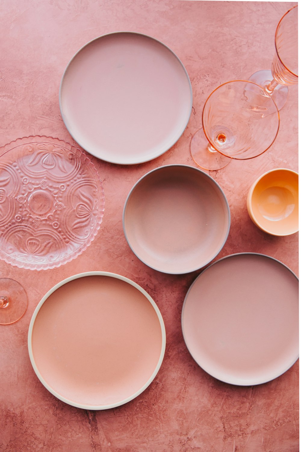 assorted plates on brown surface