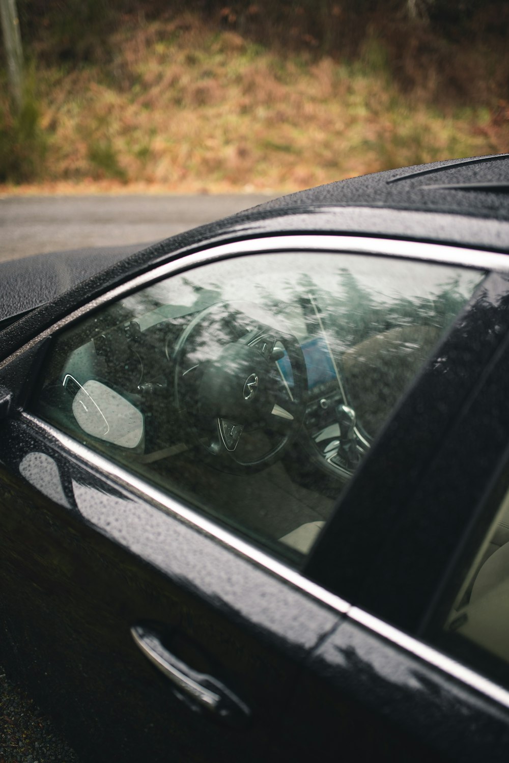 shallow focus photo of black car