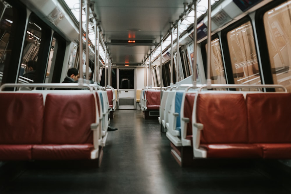 white and brown leather train benches