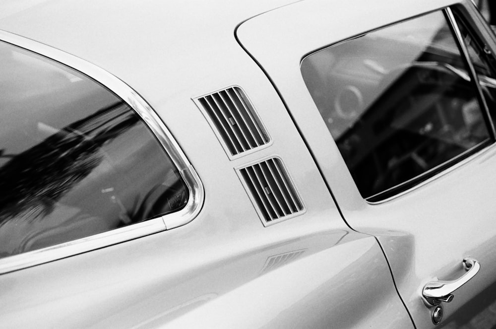 shallow focus photo of white car