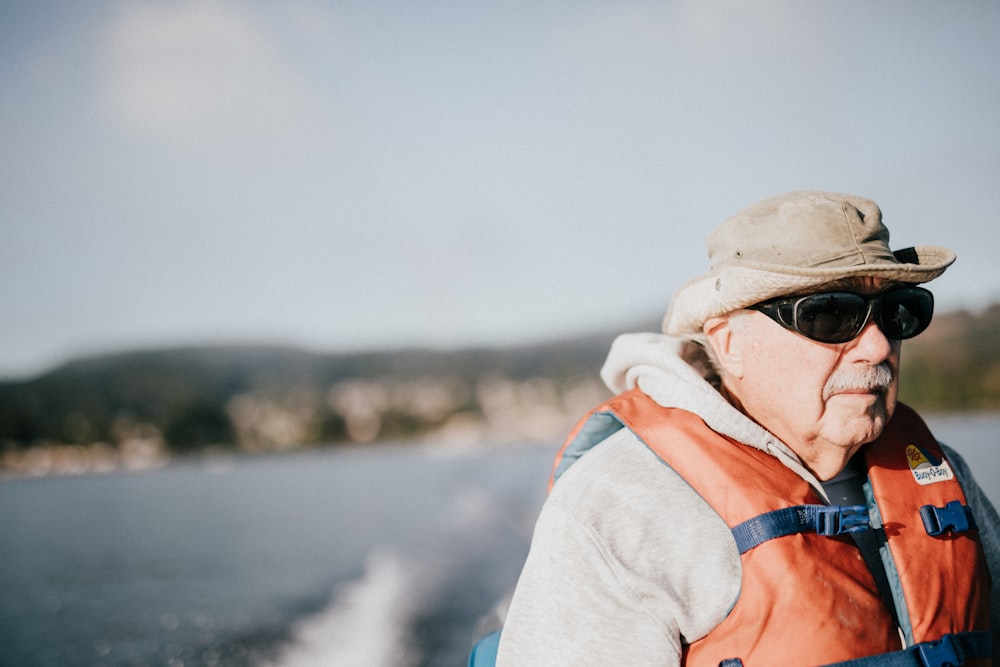 man wearing sunglasses and life vest