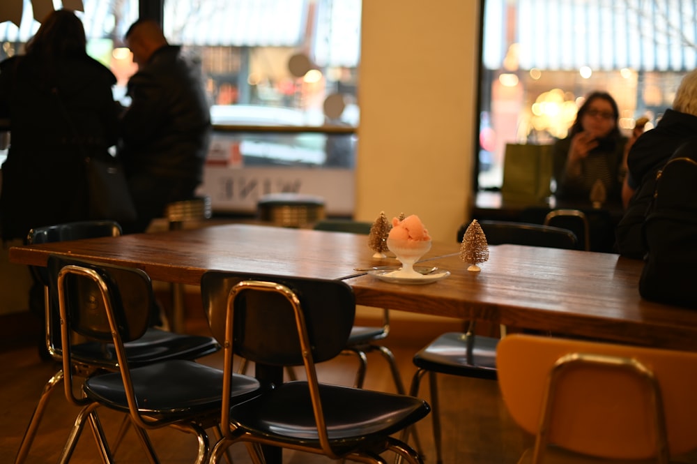 metal chairs in facing wooden table