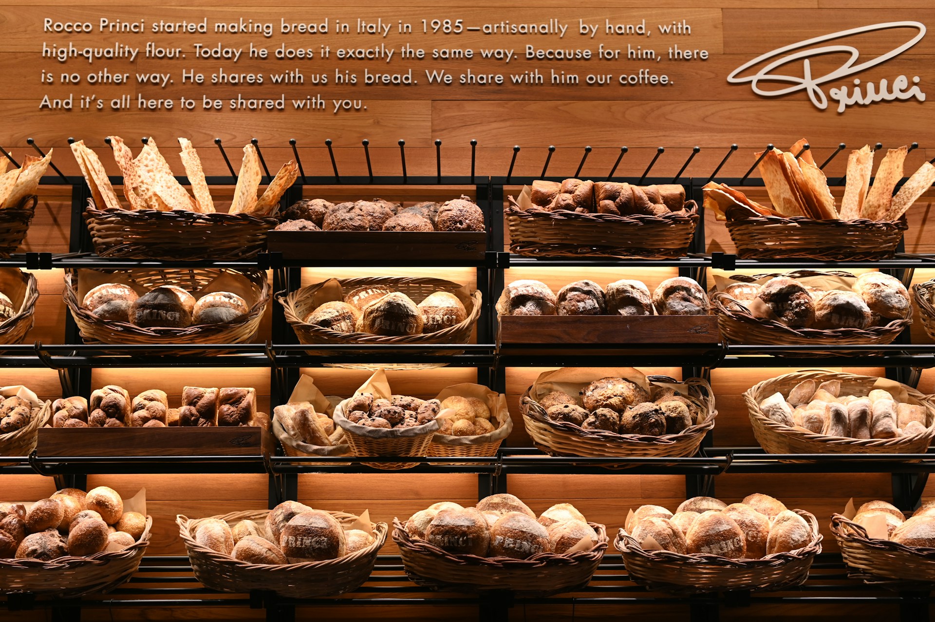 assorted bread in wicker baskets