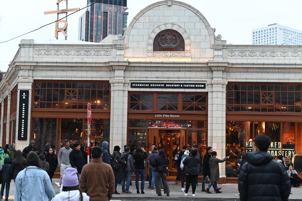 people in front of arch building