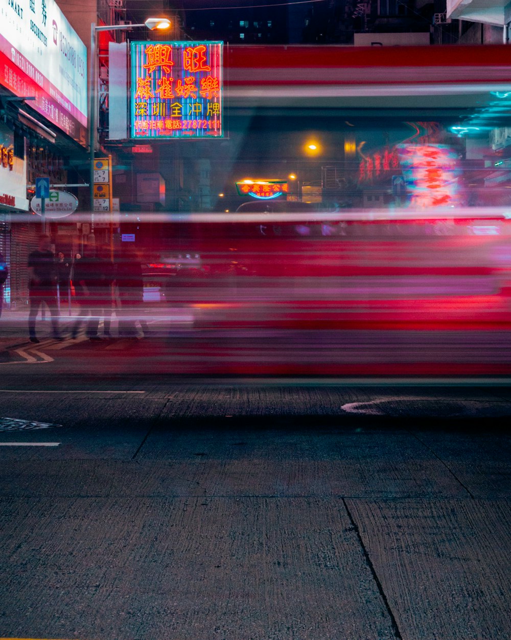 timelapse photo of red light on road