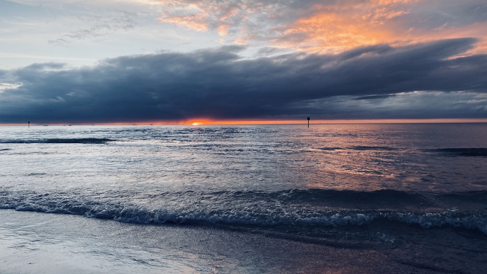 calm sea nder heavy clouds