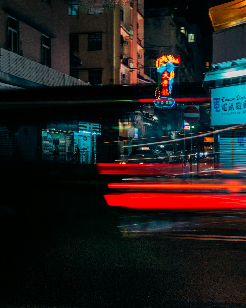 timelapse photo of red light on street