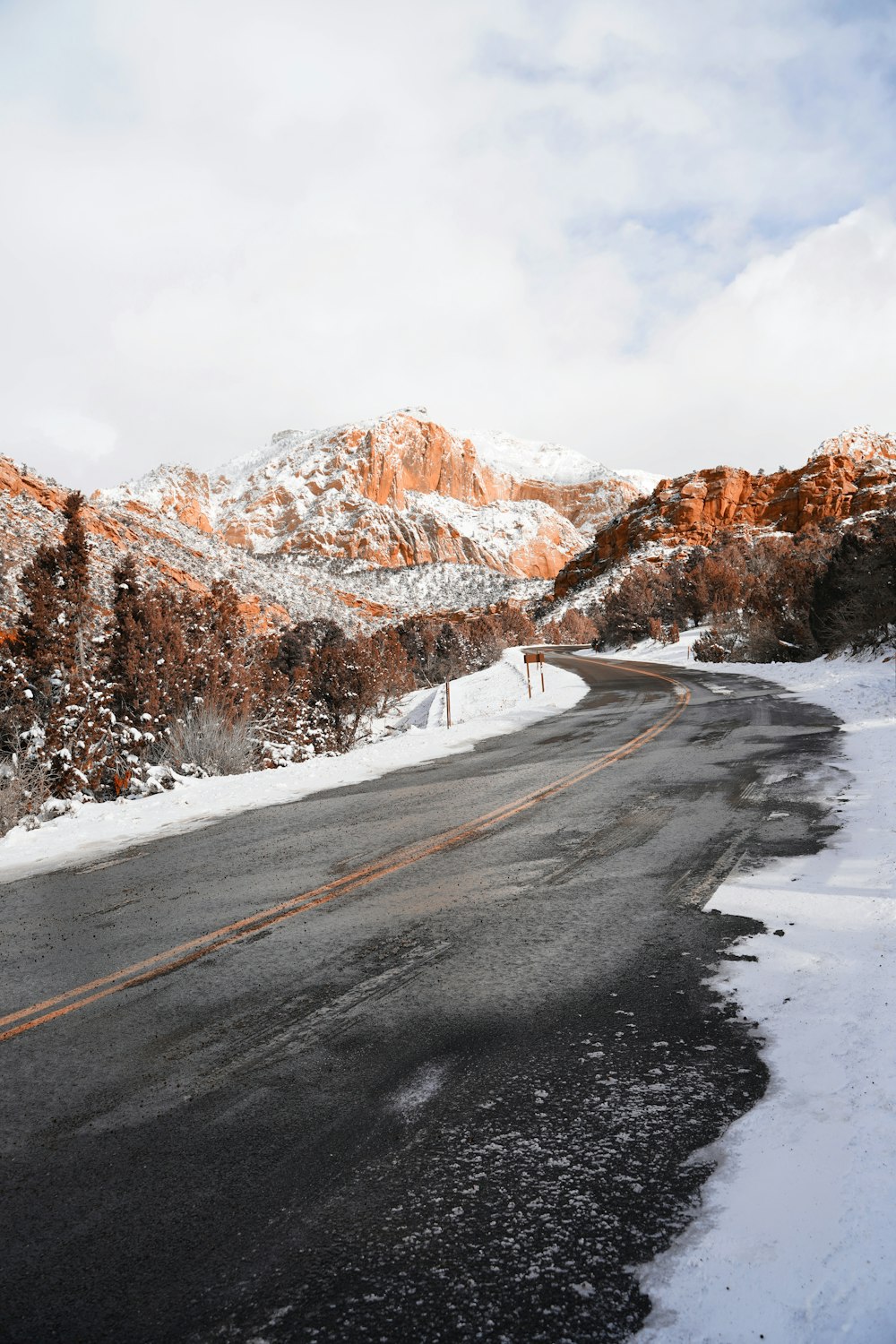 road and mountains during winter