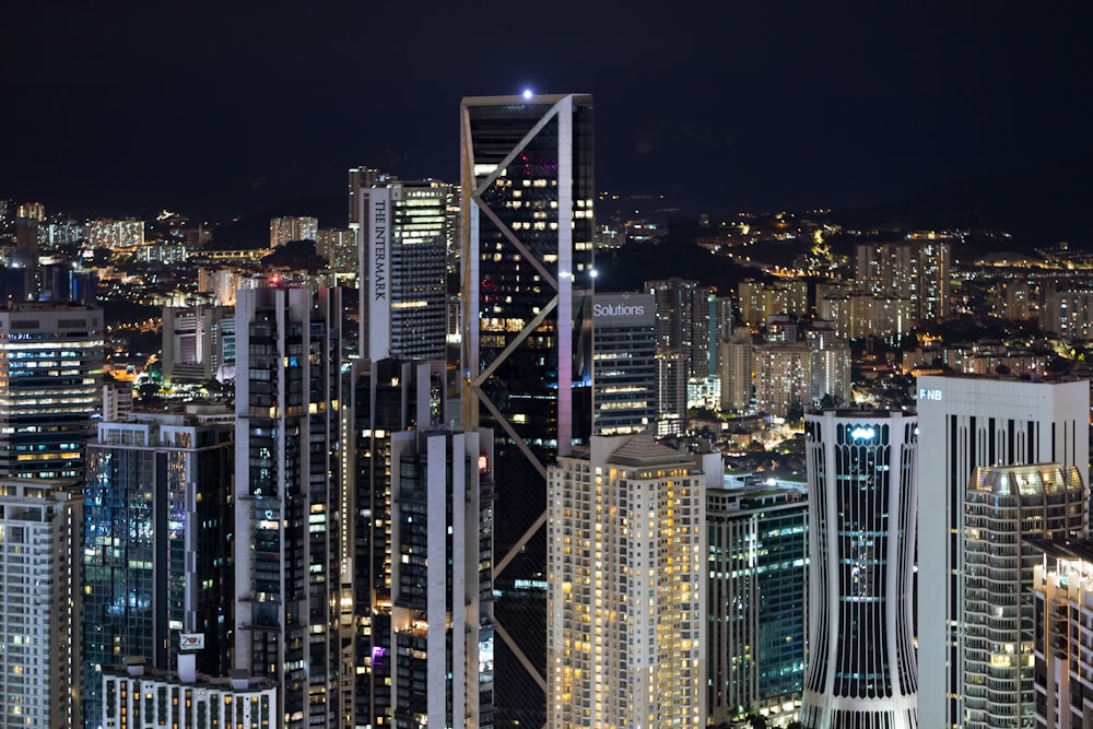 high-rise buildings at night time