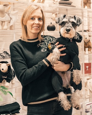 woman holding dog
