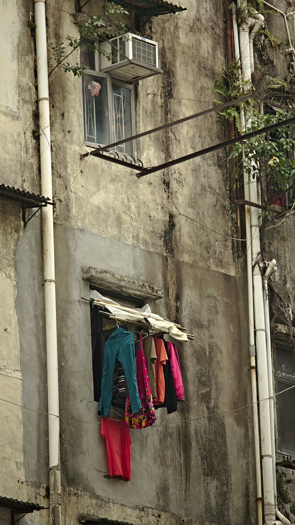 clothes hanging outside a building window