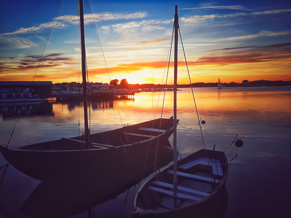 gray boat on body of water during daytime