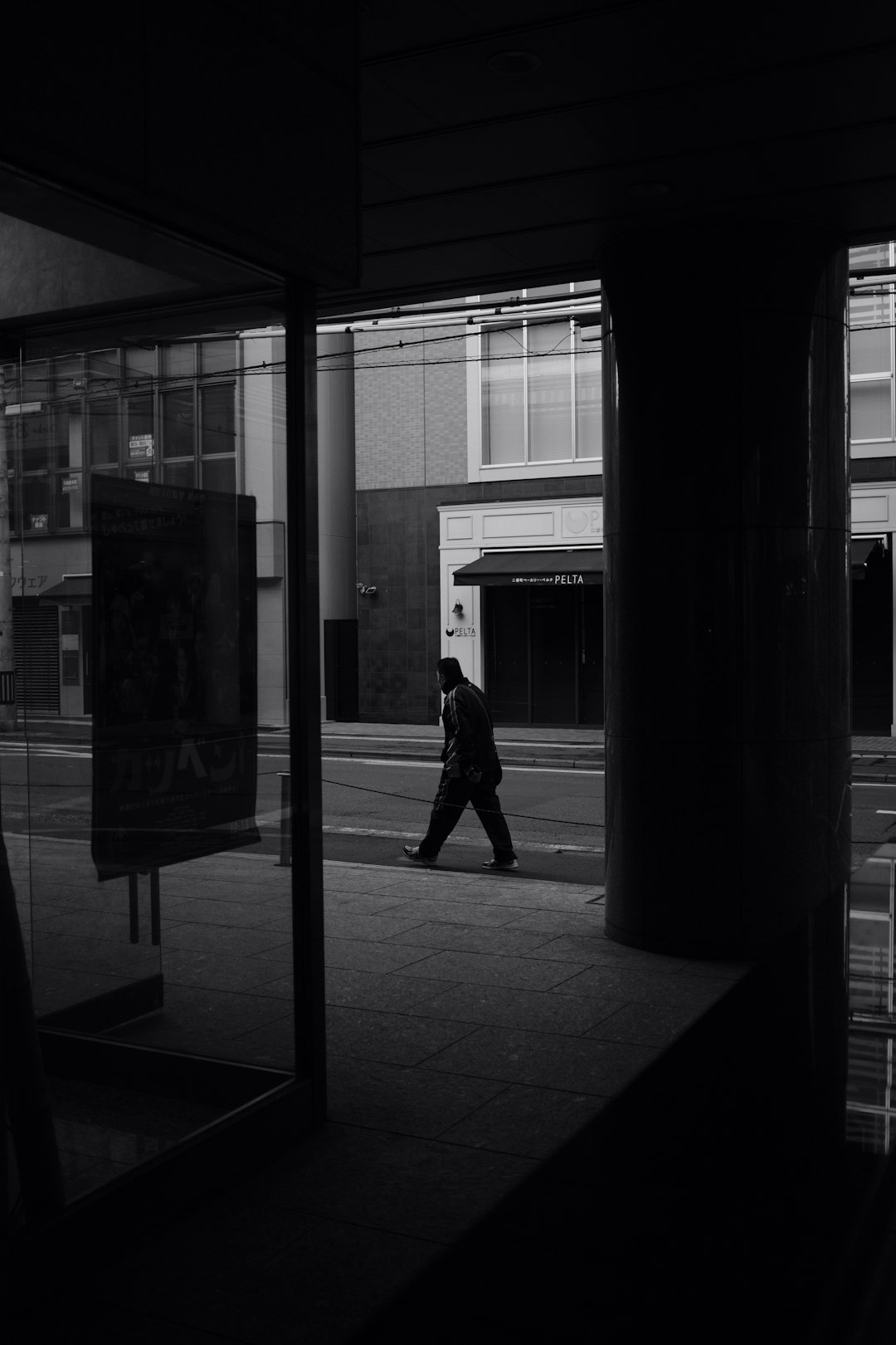 man walking near buildings
