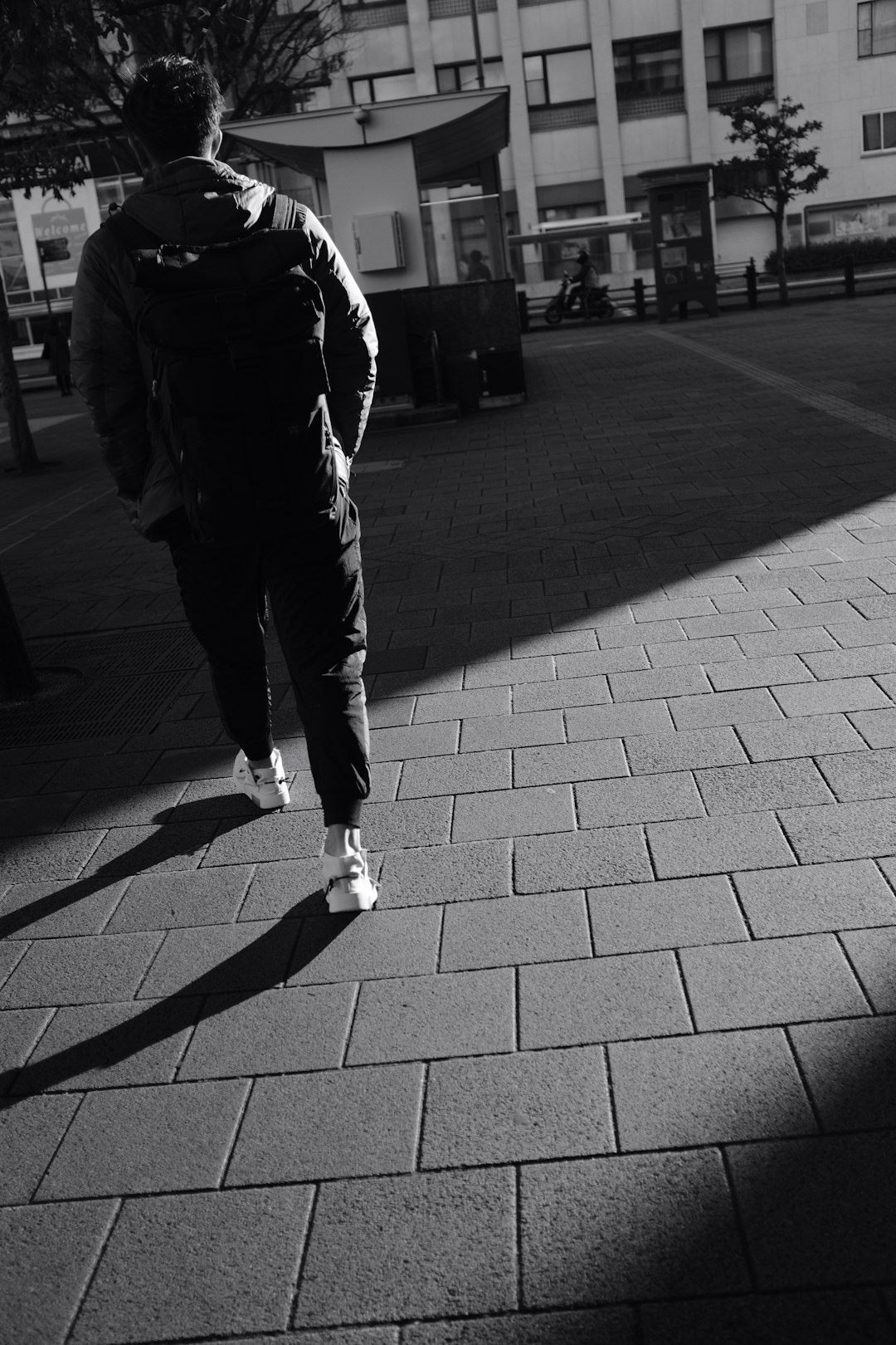 man walking near building during day