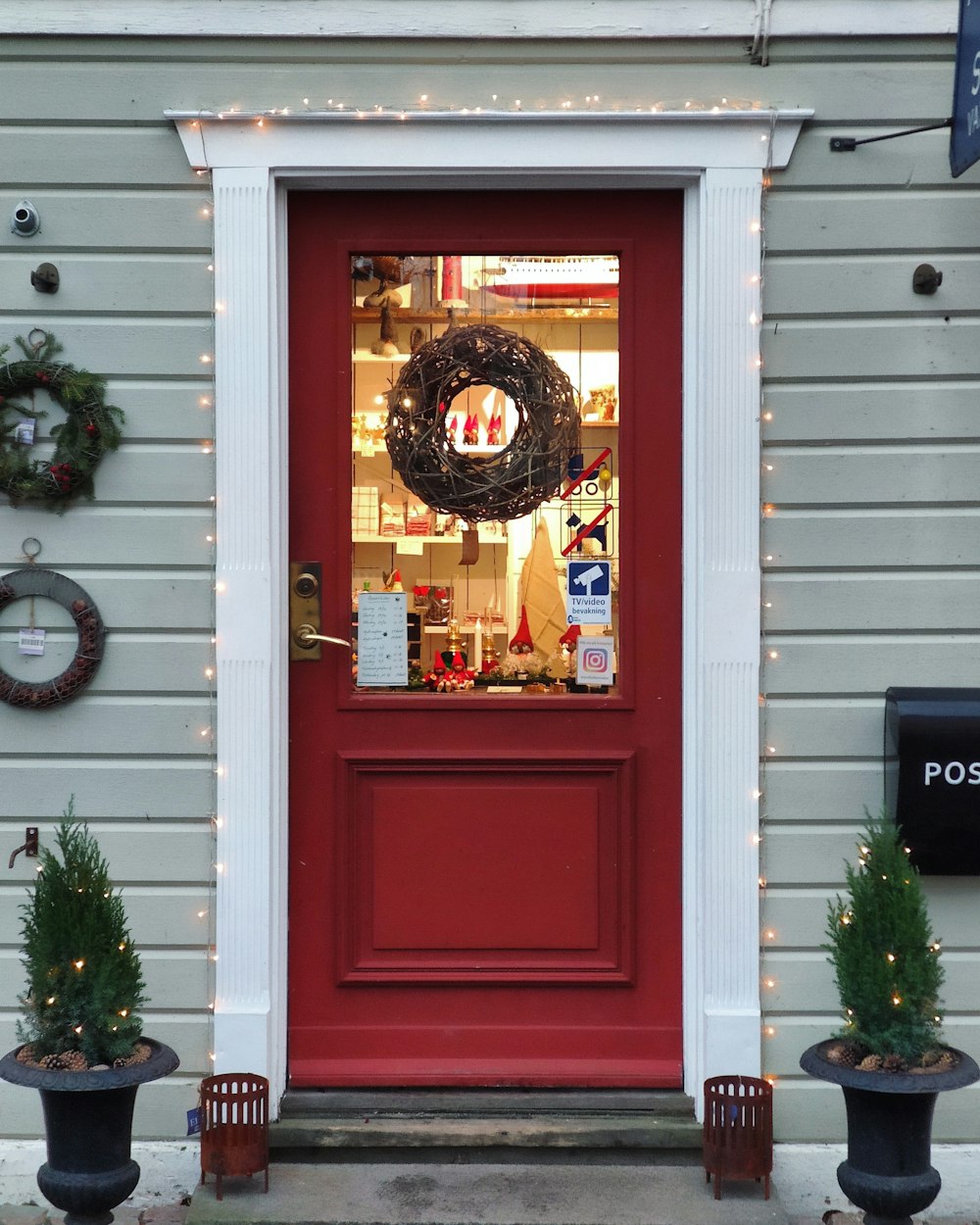 red wooden storm glass door