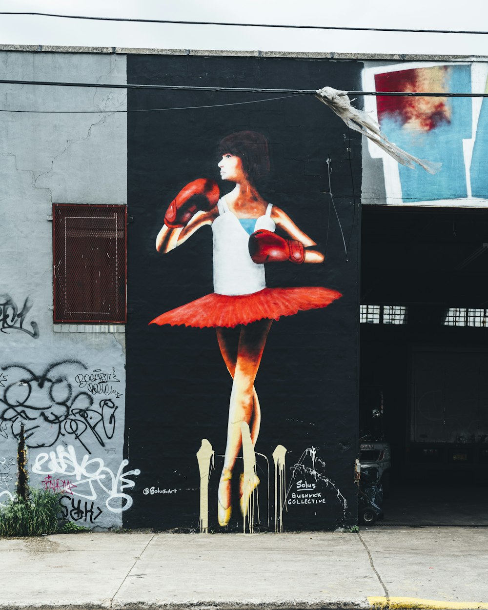 woman wearing red skirt painting