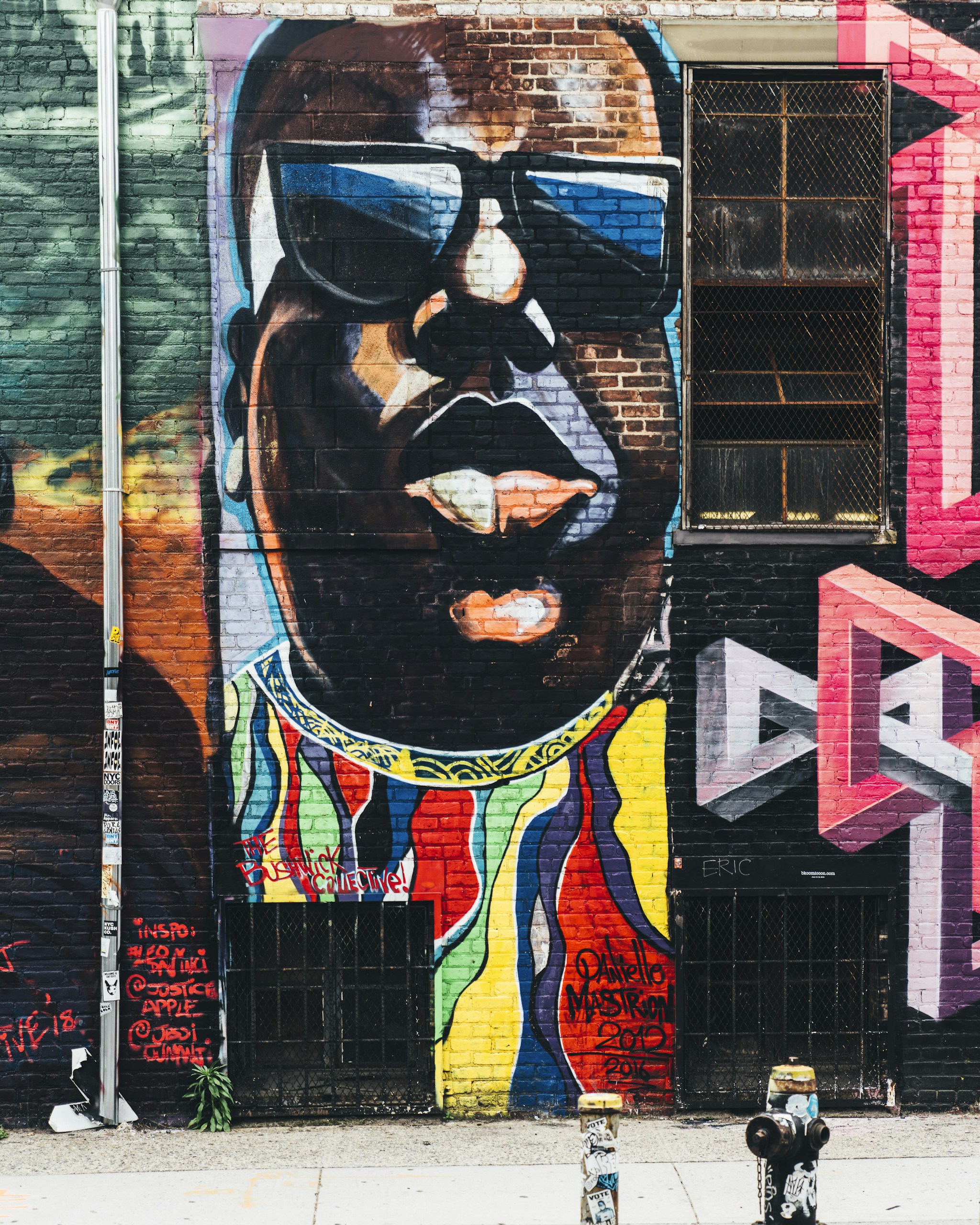 man wearing black sunglasses wall painting