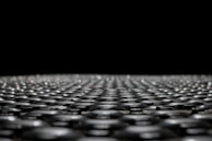 Close-up shot showing the texture and finish of a raised access flooring pedestal.