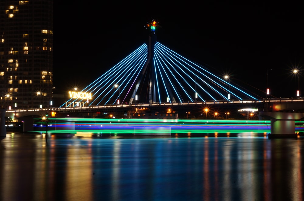 time lapse photography of bridge during night time