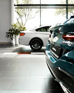 blue BMW vehicle parking inside building