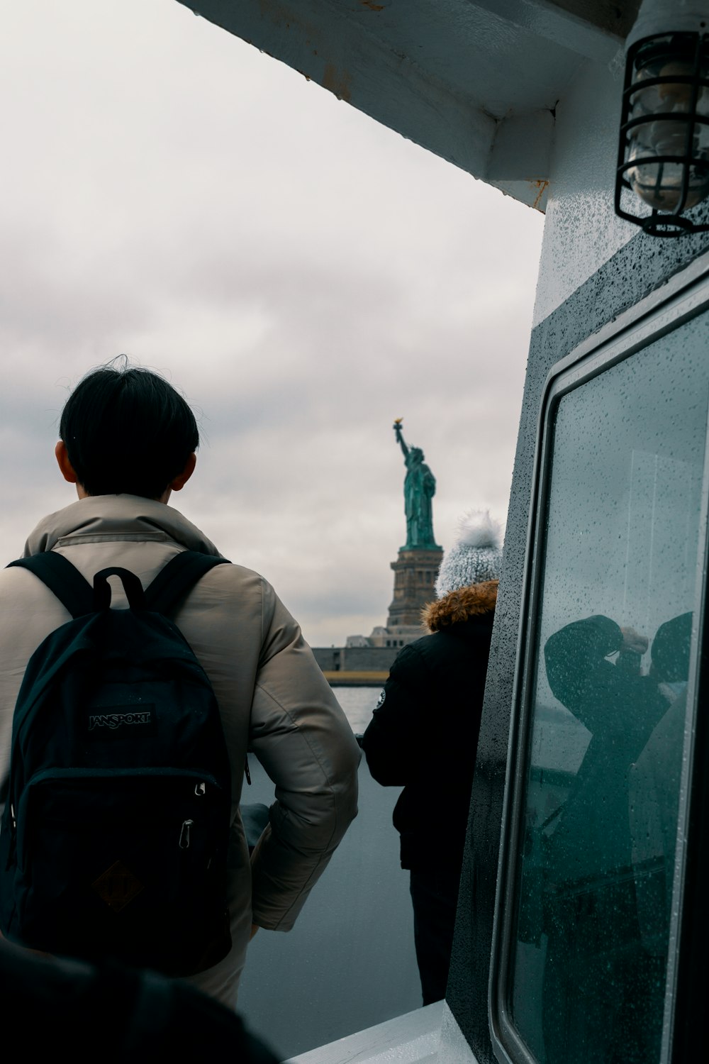 person wearing black backpack