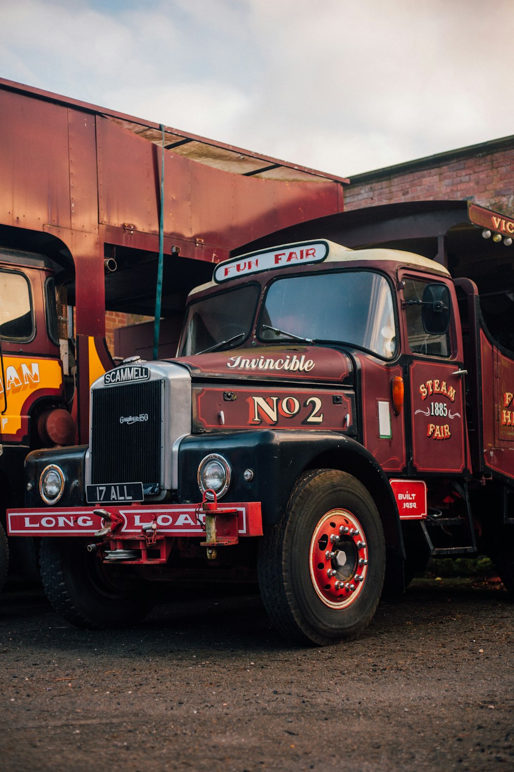 shallow focus photo of brown freight truck