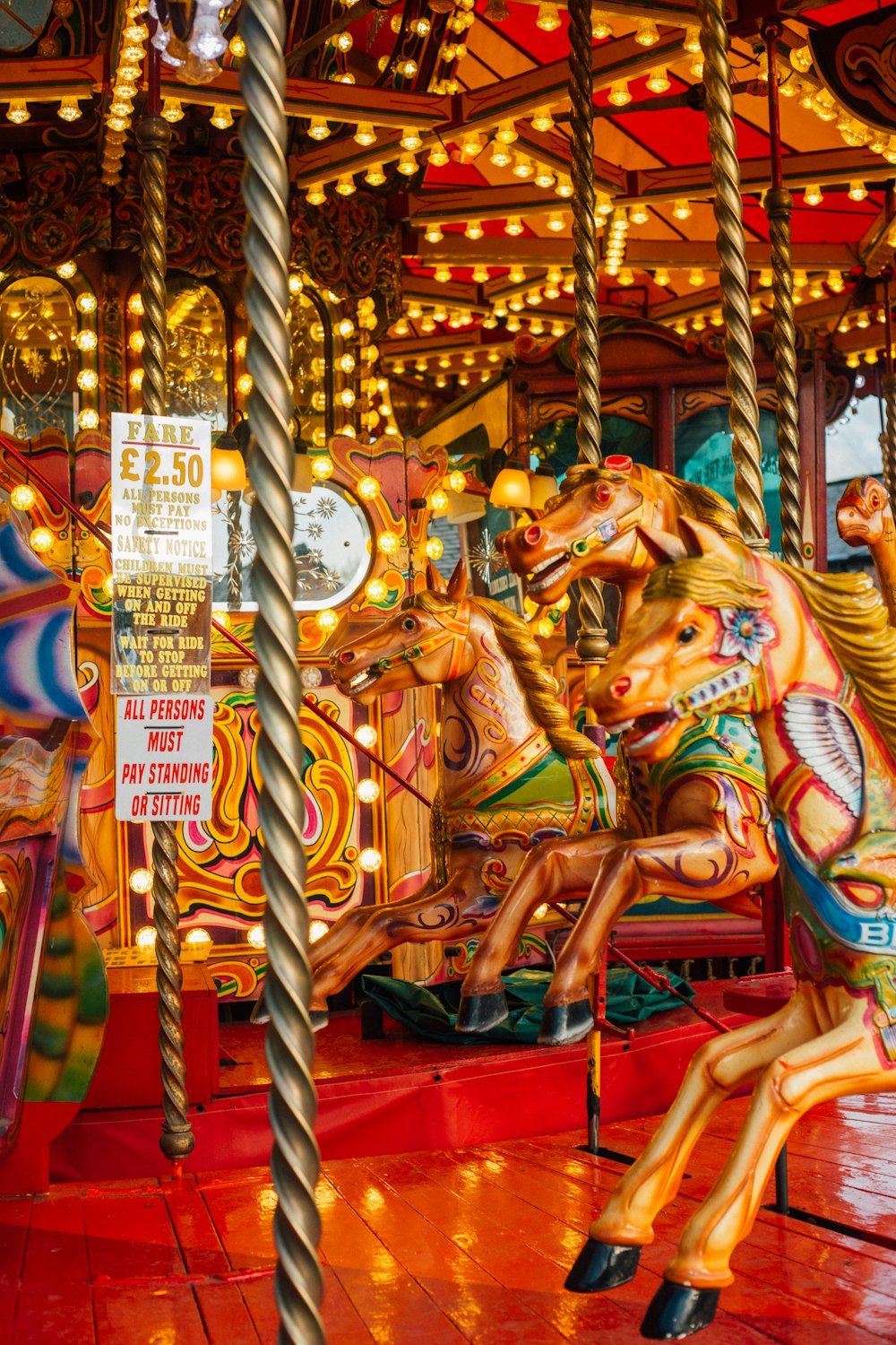 multicolored horse carousel