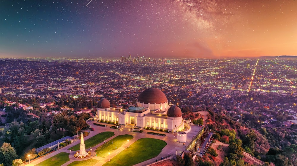 aerial photograph of city structures during sunset