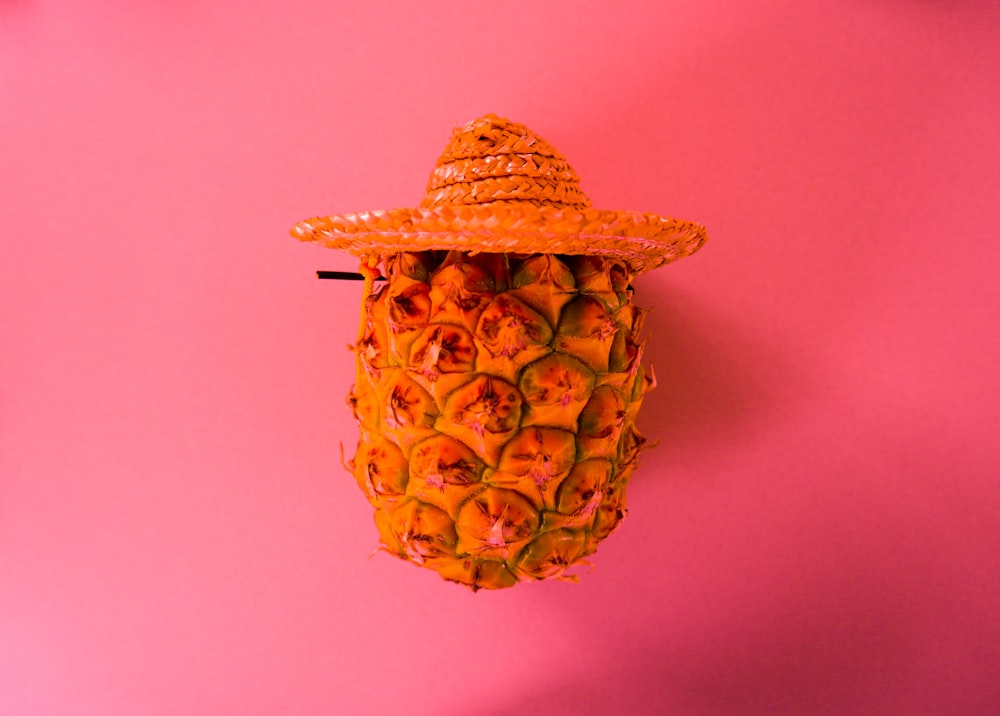 pineapple on pink surface