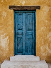 closed blue wooden door